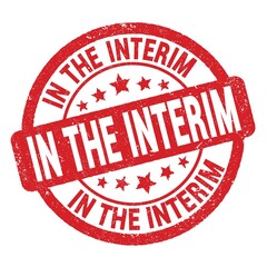 IN THE INTERIM text written on red round stamp sign.