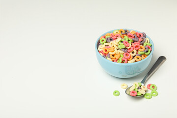 Colorful cornflakes, concept of tasty breakfast, morning food, space for text