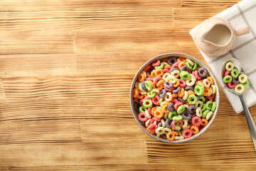 Colorful cornflakes, concept of tasty breakfast, morning food, space for text