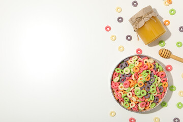 Colorful cornflakes, concept of tasty breakfast, morning food, space for text