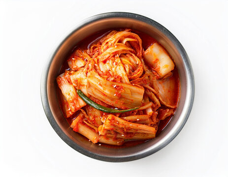 Top view of kimchi in stainless bowl isolated on white background