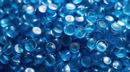 Blue translucent Plastic pellets Background Close-up Plastic granules Polymer plastic beads resin polymer
