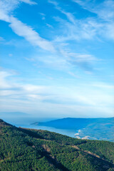 Obraz premium Mountain landscape at sunset. View of the mountains from above in the evening. Sunset view of the mountain range. Sunset in the mountains. Bursa trekking routes. Bursa, Türkiye.
