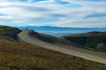 vehicle road leading to the mountains. Vehicle road leading to the summit. Roads in the mountains.
