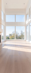 Fototapeta premium A large open living room with a fireplace and a view of the mountains
