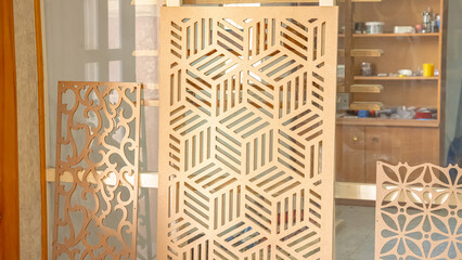 carving element. furniture in classic style. white color wood with gold trim. patina. carving. small depth of field. luxury furniture. use as background.
