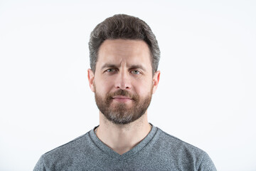 Studio close up portrait of the handsome man. A Hipster guy model headshot. Male face. Handsome man. Confident male model. Man looking proud. Closeup face of attractive man. Elegant guy.