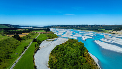 The aerial view with road way with an  ecosystem of the River lagoon Valley and blue water river