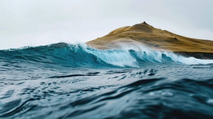 Tall hill and deep ocean waves