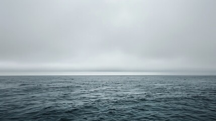 Obraz premium Scenic ocean vista with overcast sky