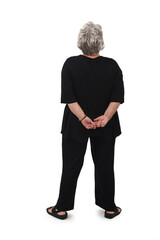 rear view of a senior woman standing  and arms on back on white background