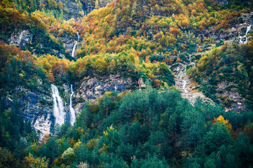 Autumn in Val Raccolana. Between peaks, lakes and streams. Julian Alps