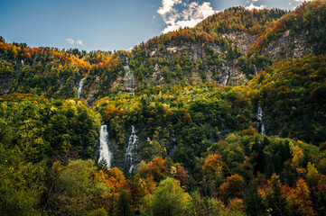 Obraz premium Autumn in Val Raccolana. Between peaks, lakes and streams. Julian Alps and Fontanone di Goriuda