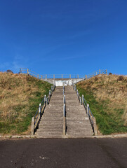 Concrete Steps at ArbroathÕs Victoria Park allowing access from the steep upper slope down to...