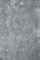 Ancient Roman Diocletian's price edict in Latin language inscribed in stone, showcasing early epigraphy and economic history