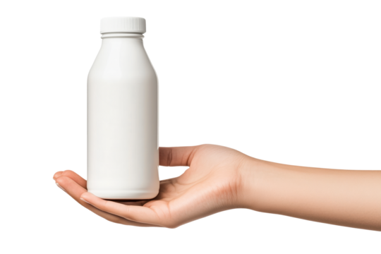 Hand holding a glass bottle of milk isolated on white background. Concept of dairy product and healthy living.