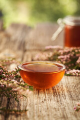 A bowl of fresh wild heather or Calluna vulgaris syrup