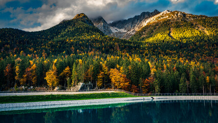 Autumn in Val Raccolana. Between peaks, lakes and streams. Julian Alps