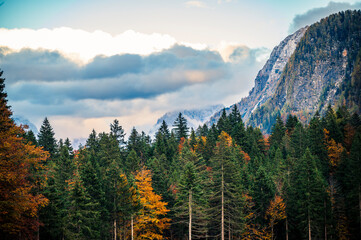 Autumn in Val Raccolana. Between peaks, lakes and streams. Julian Alps