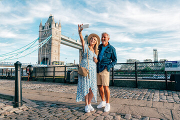 Happy senior couple spending time together in London city. Concepts about seniority, lifestyle and...