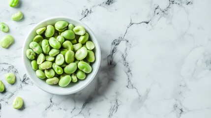 Green and Fresh: Vibrant Broad Beans on a Gleaming Marble Countertop