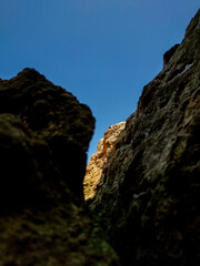 split rock hill landscape photo, blue sky background
