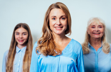 Cinematic portrait image of grandmother, mother and grandaughter