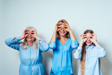 Cinematic portrait image of grandmother, mother and grandaughter