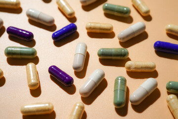 Mix of medicine capsules pills, supplements vitamins, Assorted pharmaceutical medicine capsules