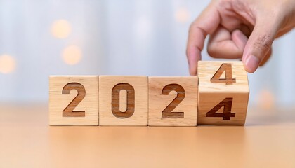 flipping wooden cubes symbolizing new year preparations