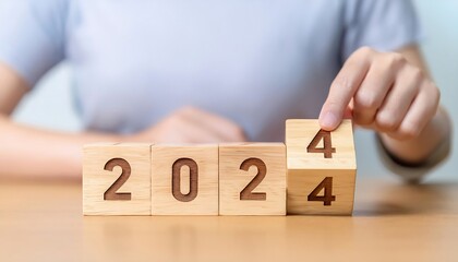 flipping wooden cubes symbolizing new year preparations
