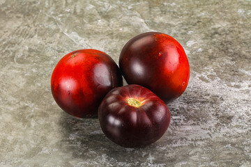 Black ripe juicy organic tomato