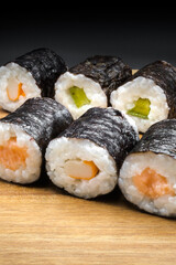 Sushi, a Japanese dish made of cooked rice
