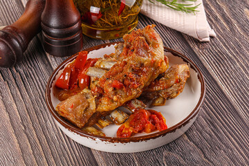 Baked lamb ribs with vegetables