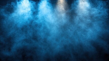 A blue fog fills the air under focused lights, setting a mysterious and moody atmosphere for any event or performance