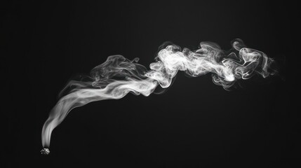 The tendrils of smoke drift delicately upward, enhancing a serene ambiance in a dimly lit space