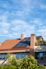 detail of a house with an installation of photovoltaic solar panels to harness the sun's energy....