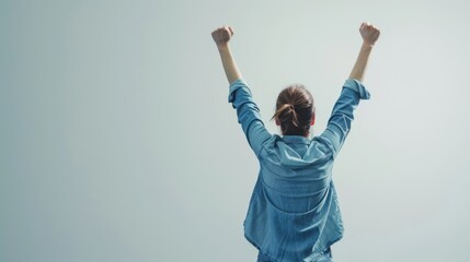 A person with hands in the air, expressing excitement while stan