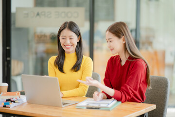 Asian businessman sitting and talking, working at the office