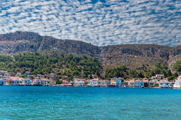 Fototapeta premium Traditional multicolored, colorful seaside houses in Kastellorizo ​​island, Dodekanisos, Greece