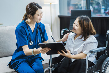 Fototapeta premium Friendly nurse doctor disease patient support during recovery, caregiver taking care of her patient and showing kindness while doing a checkup in home.