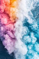 Fototapeta premium Colorful abstract smoke pattern, blend of vibrant hues on a dark background.