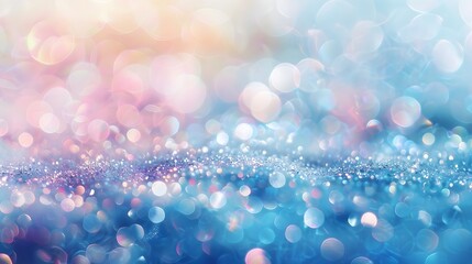 Abstract blue and pink bokeh background with glittering sparkles.