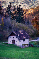 Autumn in Val Degano. Ovaro and its characteristic villages. The house with a hundred windows