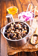 marinated mushrooms in metal bowl