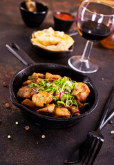 Fried meat with herb and spices.