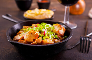 Fried meat with herb and spices.