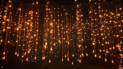 Twinkling LED lights hang elegantly along a charming walkway during a serene evening