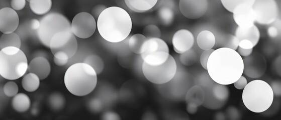 Grey and black & white bokeh pattern with soft and sharp light orbs, creating a minimalistic, modern, and elegant design in 4K resolution