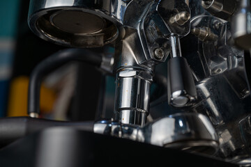 This series of close-up images showcases the intricate details of a professional espresso machine, capturing the essence of a barista's craft. 